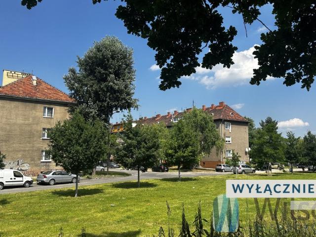 Dwupokojowe mieszkanie z dużą kuchnią i potencjałem inwestycyjnym