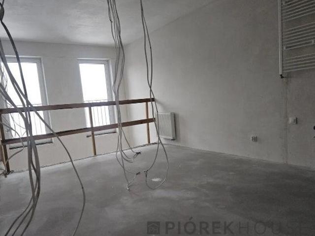 Dwupoziomowe 75m2 z antresolą, garażem i balkonami