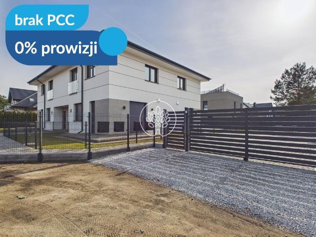 Dwupoziomowy apartament z ogrodem i tarasem w Eskulapie