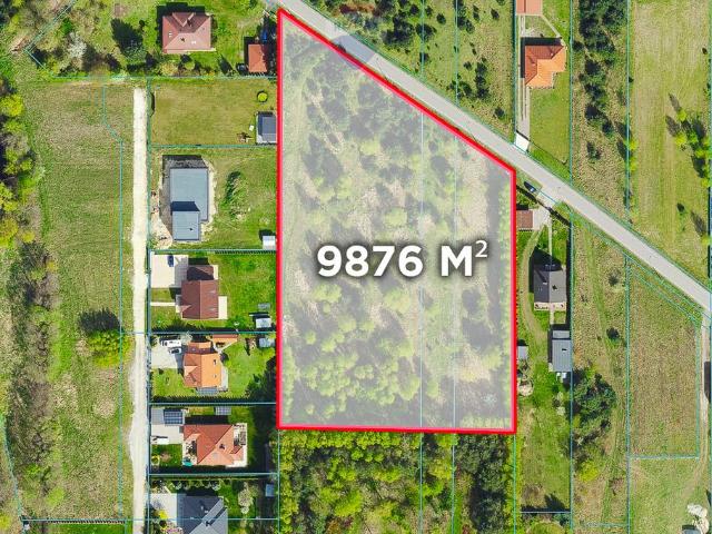 Duża działka 9876 m² z planem zagospodarowania i dostępem do mediów