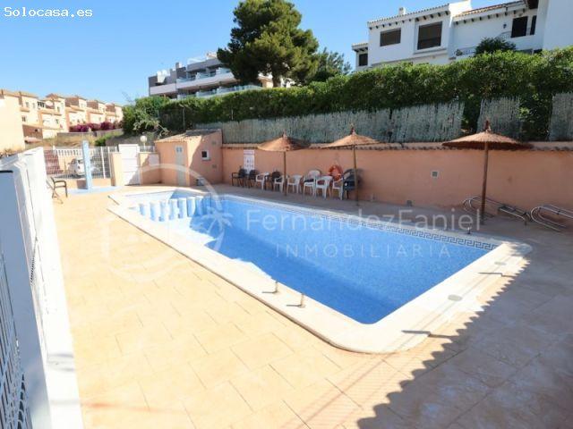 Dúplex con terraza y piscina comunitaria en Playa Flamenca