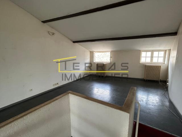 Duplex à rénover agrémenté de sa terrasse au coeur de l'Encl