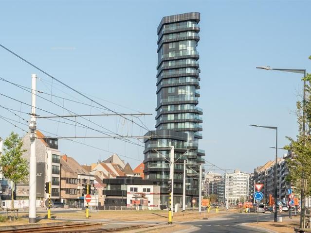 Duplex appartement te koop in het prestigieuze en architectonisch nieuwbouwproject Heldentoren, gelegen aan het Heldenplein te H