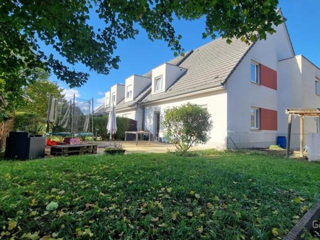 Duplex avec grand jardin