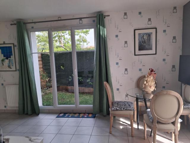 Duplex avec jardin