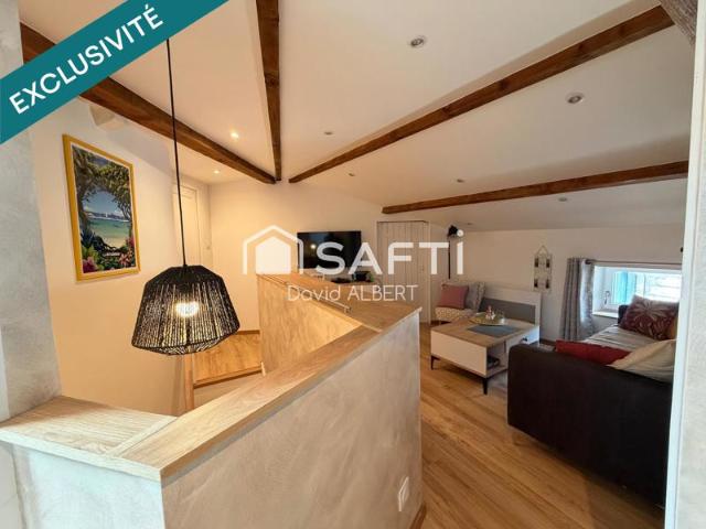 Duplex de caractère avec garage à deux pas du centre ville