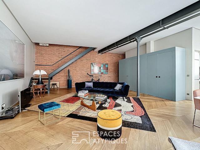 Duplex dernier étage esprit loft rénové par architecte proche Place des Victoires