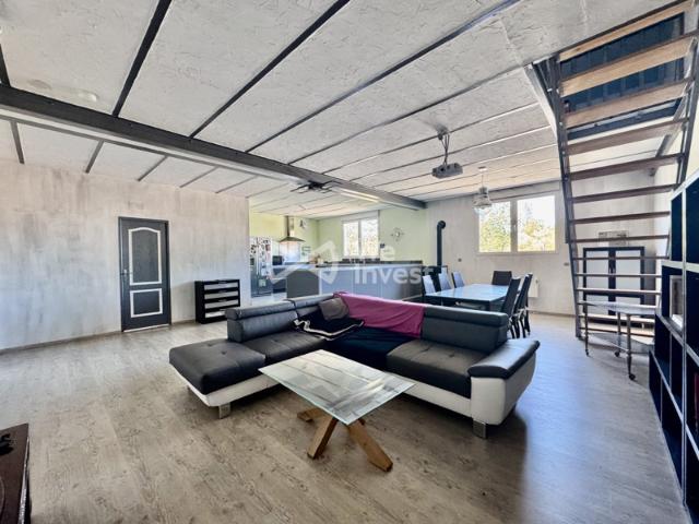 Duplex esprit loft 93 m² Carrez, une place de stationnement et