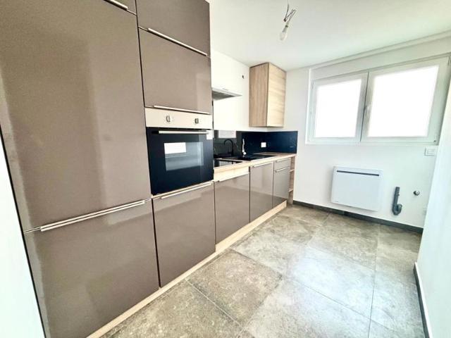 Duplex rénové de 60 m2 avec cave+2 garages à herserange