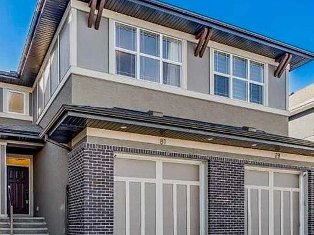 Duplex With Attached Front Garage For Sale