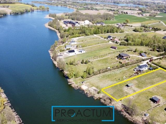 Działka nad jeziorem 3136 m² z domem i linią brzegową