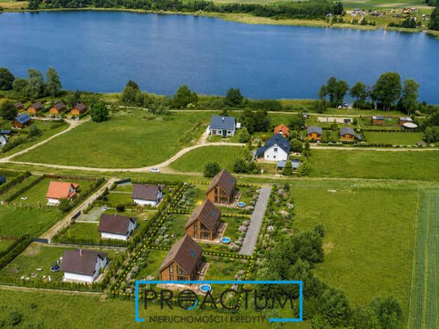 Działka nad jeziorem z fundamentem, W+E, Mazury