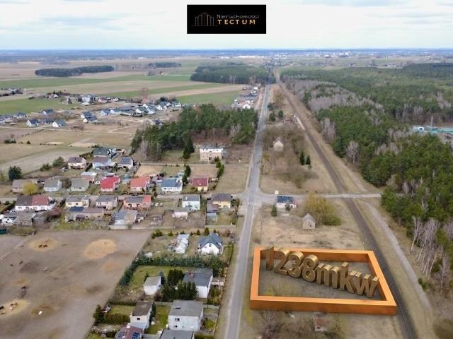 Działka budowlana 1238 m² z mediami i szybkim dojazdem