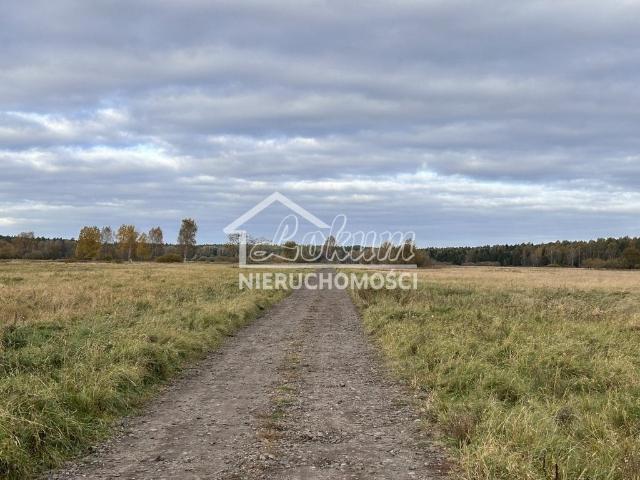 Działka budowlana 2103 m² z planem, blisko lasów i jeziora
