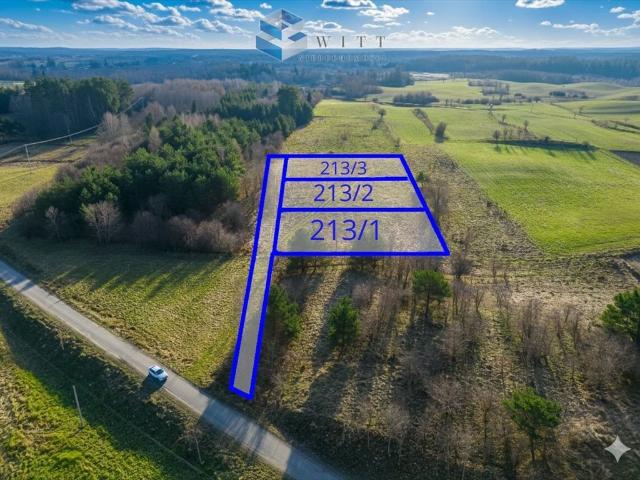 Działka budowlana nad jeziorem w Szałstrach – 1808 m²