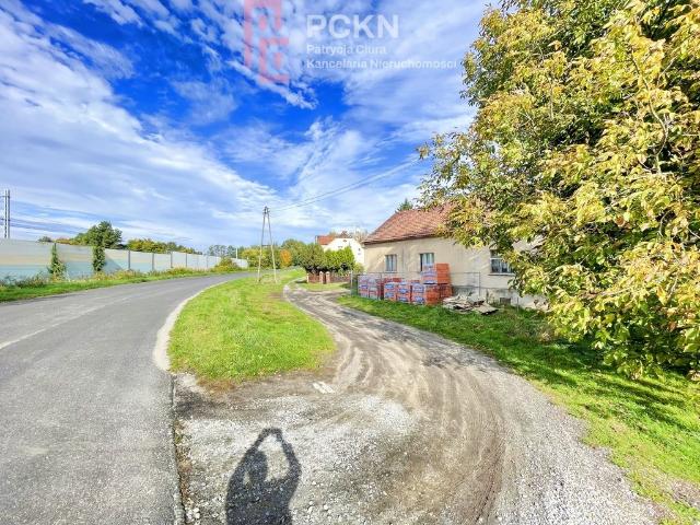 Działka inwestycyjna 1753 m² z budynkiem do adaptacji