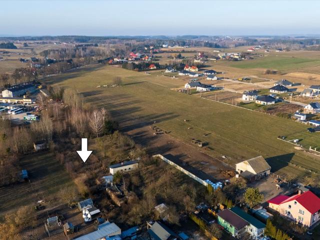 Działka inwestycyjna 1832 m² z budynkami w Szczytnie