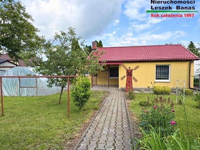 Działka ROD z domkiem, garażem i tarasem, 380 m²