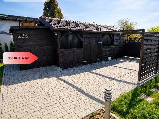 Działka ROD 500 m² z domkiem i szklarnią w Chojnicach