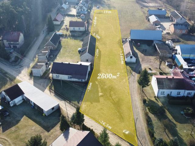 Działka rolna 2600 m² z warunkami zabudowy, blisko rzeki