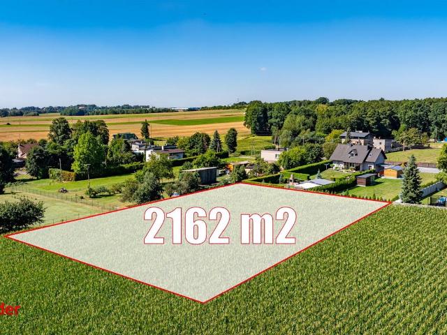 Działka rolna 2162 m² z mediami i widokami na łąki