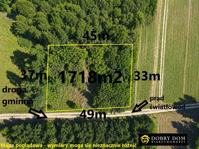 Działka siedliskowa 1718 m² z warunkami zabudowy i ogrodem