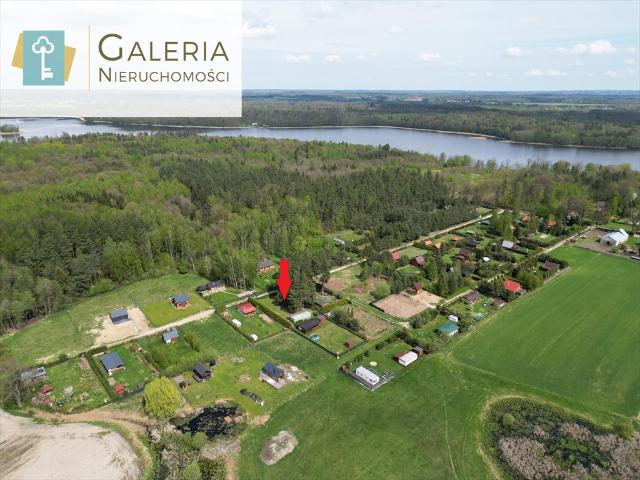 Działka z domkiem nad jeziorem w Szymonowie 809 m2