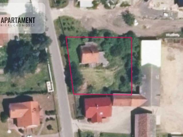 Działka 1000 m² z budynkiem, media, blisko Środy