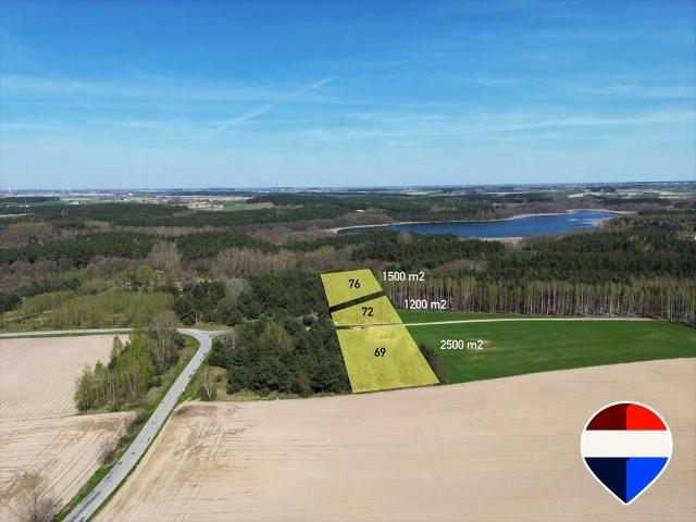 Działka 2500 m² z warunkami zabudowy i dostępem do jezior