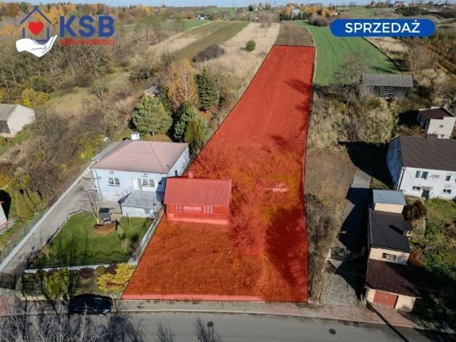 Działka 2000 m² z dostępem do mediów i domem do remontu