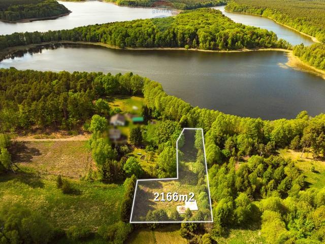 Działka 2166 m² z fundamentem i widokiem na jezioro