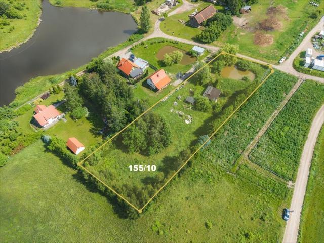Działka 3705 m² z stawem i budynkami w Różnowie