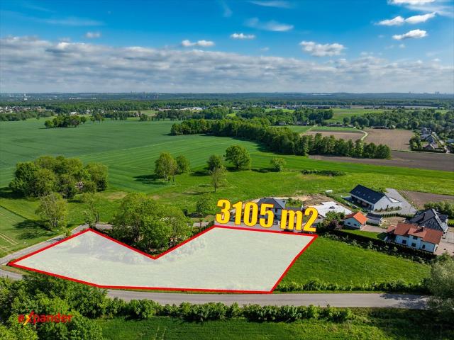 Działka 3105 m² z mediami i widokami na pola
