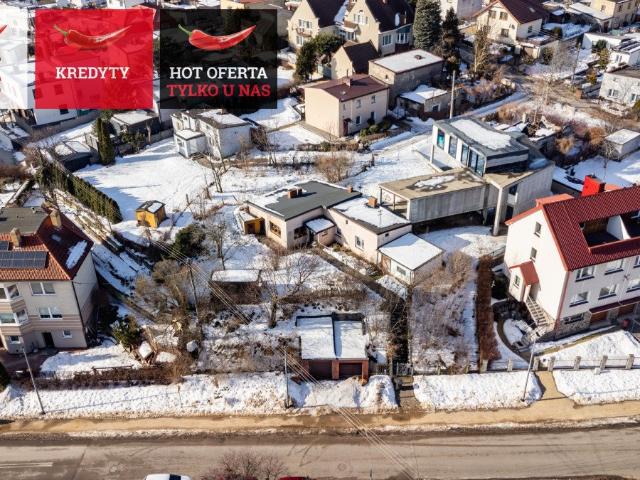 Działka 818 m² z domem i garażem w Obłużu – inwestycja