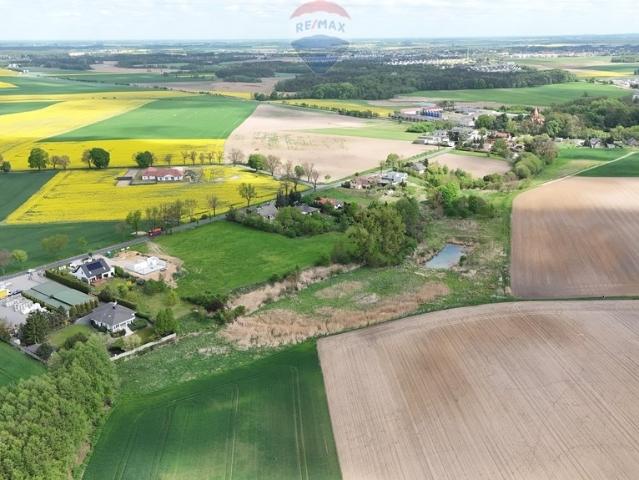 Działka 9521 m² pod zabudowę jednorodzinną i inwestycję