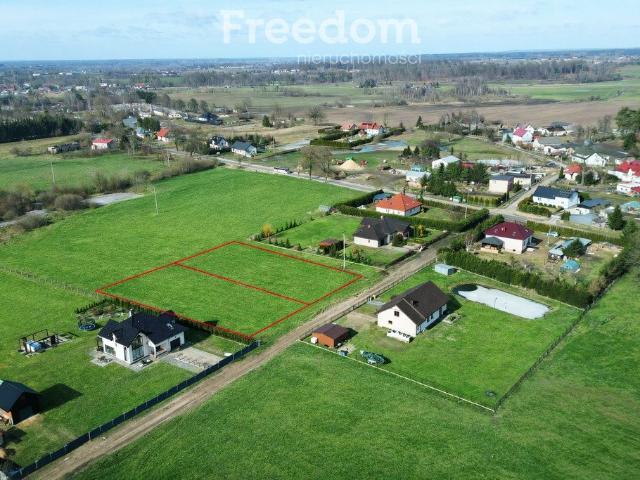Do sprzedania działki budowlane 1562 m² w Rudzienicach