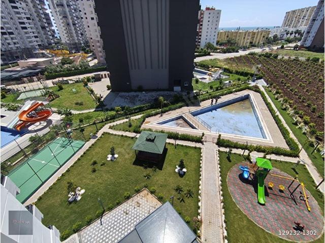ÇEŞMELİ'DE DENİZE YÜRÜME MESAFESİN'DE HAVUZLU 2+1 CONCEPT DAİRE