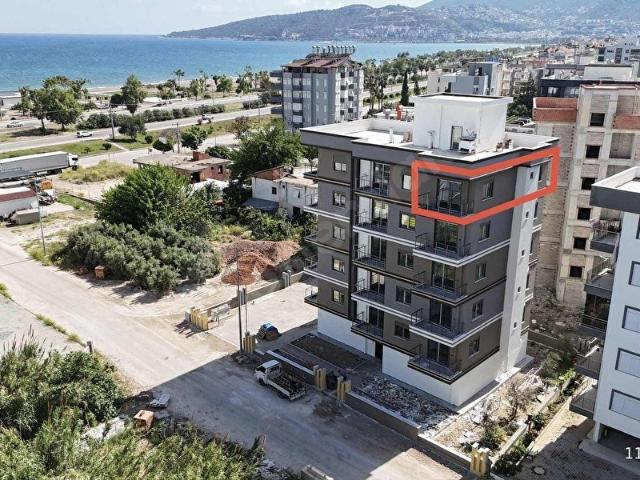 EŞSİZ DENİZ MANZARALI VE ÖNÜ KAPANMAZ SIFIR GENİŞ 1+1