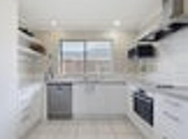 Easy Care by the Coast Awaiting Your Vision!