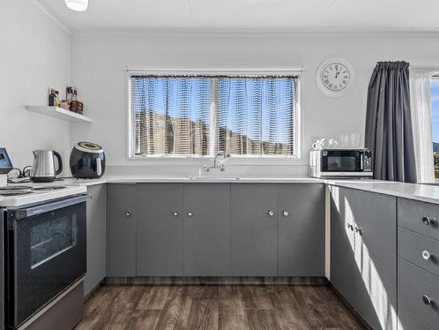 Easy Care Living with a Sunny, Elevated Outlook