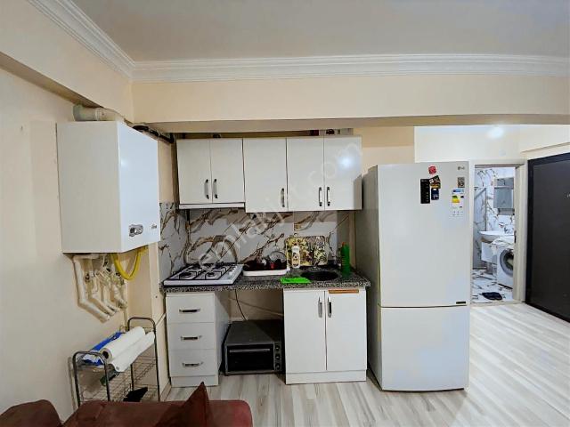 Ege emlaktan İspat Cami Mahallesinde Eşyalı 1+1 Kiralık Daire