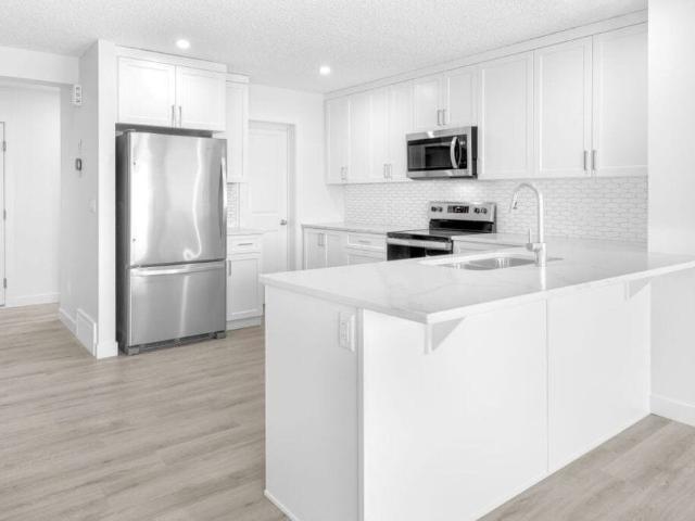 Edmonton Unfurnished townhouse Rental in Cavanagh Chic and Luxury 3 bedroom Main Floor Brand new in Cavanagh!