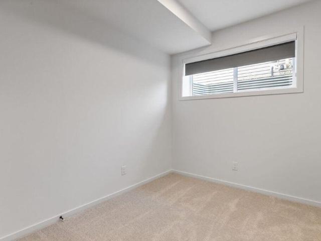 Edmonton Unfurnished Condo Rental in Parkdale New Bright South Facing Unit with Premium Finishes & In Suite Laundry!
