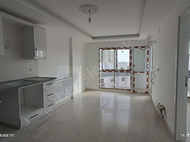 EKB'DEN TAŞUCU MERKEZDE OTOPARKLI SİTE İÇİNDE FIRSAT 1+1 DAİRE
