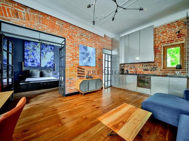 Ekskluzywny apartament z historycznym urokiem i nowoczesnym designem
