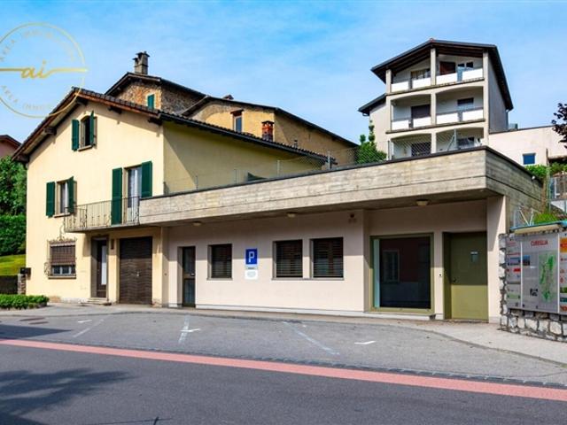 EINZELHAUS MIT ANGELEGTEM GESCHÄFTSLOKAL