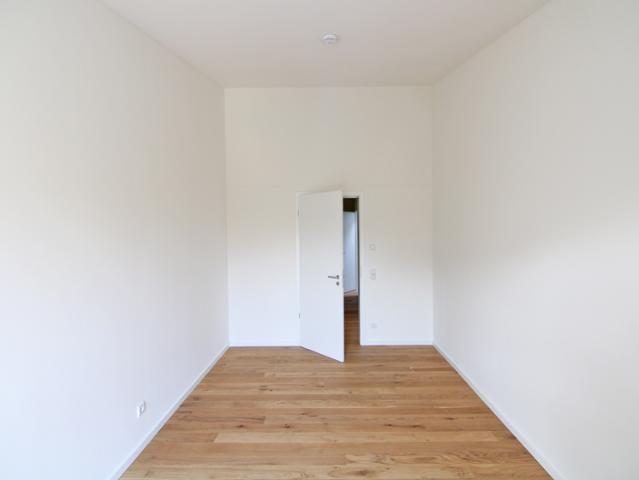 Einziehen und Wohlfühlen: Erstbezug! Herrliche Balkonwohnung mit allen Extras und Kfz/Wallbox!