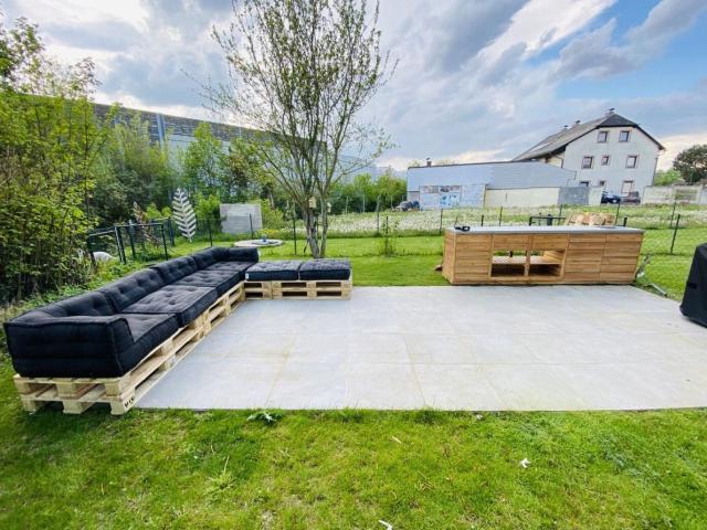 Einzigartige Loft Wohnung mit Eigengarten direkt am Mühlbach: Stilvoll, exklusiv und ideal für Singles oder Paare!