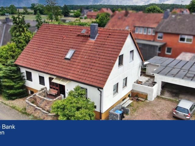 Einzigartige Wohngelegenheit in Helstorf Einfamilienhaus mit großer Garage für vier Autos