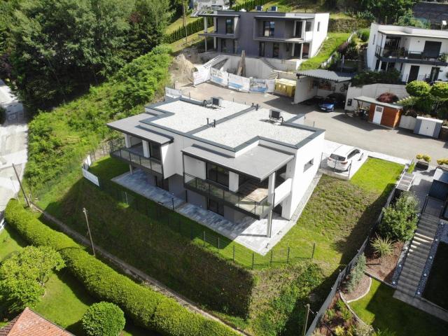 Einzigartiger Ausblick – neues, modernes Haus in stadtnaher Lage. Belagsfertig